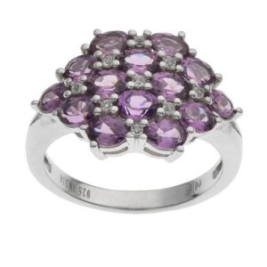 A beautiful cluster of Royal Purple Garnets in a setting of white Topaz, Size “5”